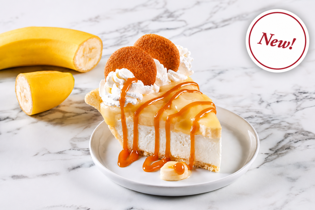 Bakery & Desserts, Banana cream pie slice topped with fresh banana slices, whipped cream, caramel drizzle and crisp cookie wafers.