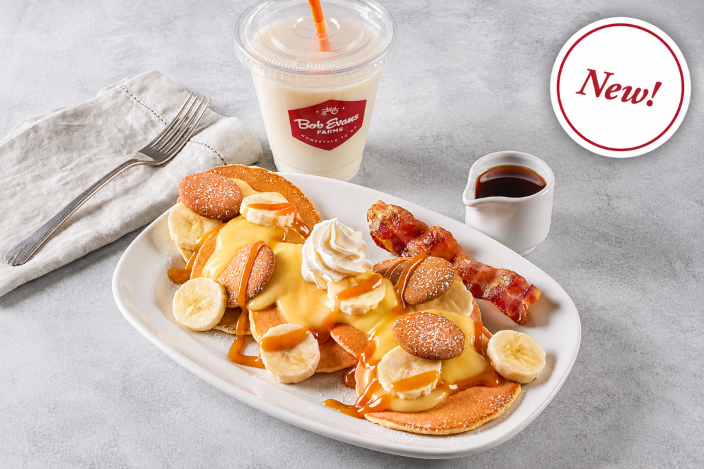 Kids Menu, Kids banana pancakes topped with banana slices, creamy topping, caramel drizzle and whipped cream, served with crispy bacon and syrup.