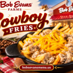 Bob Evans Cowboy Fries topped with crispy French fries, sausage gravy, and melted cheddar cheese in a cast iron skillet.